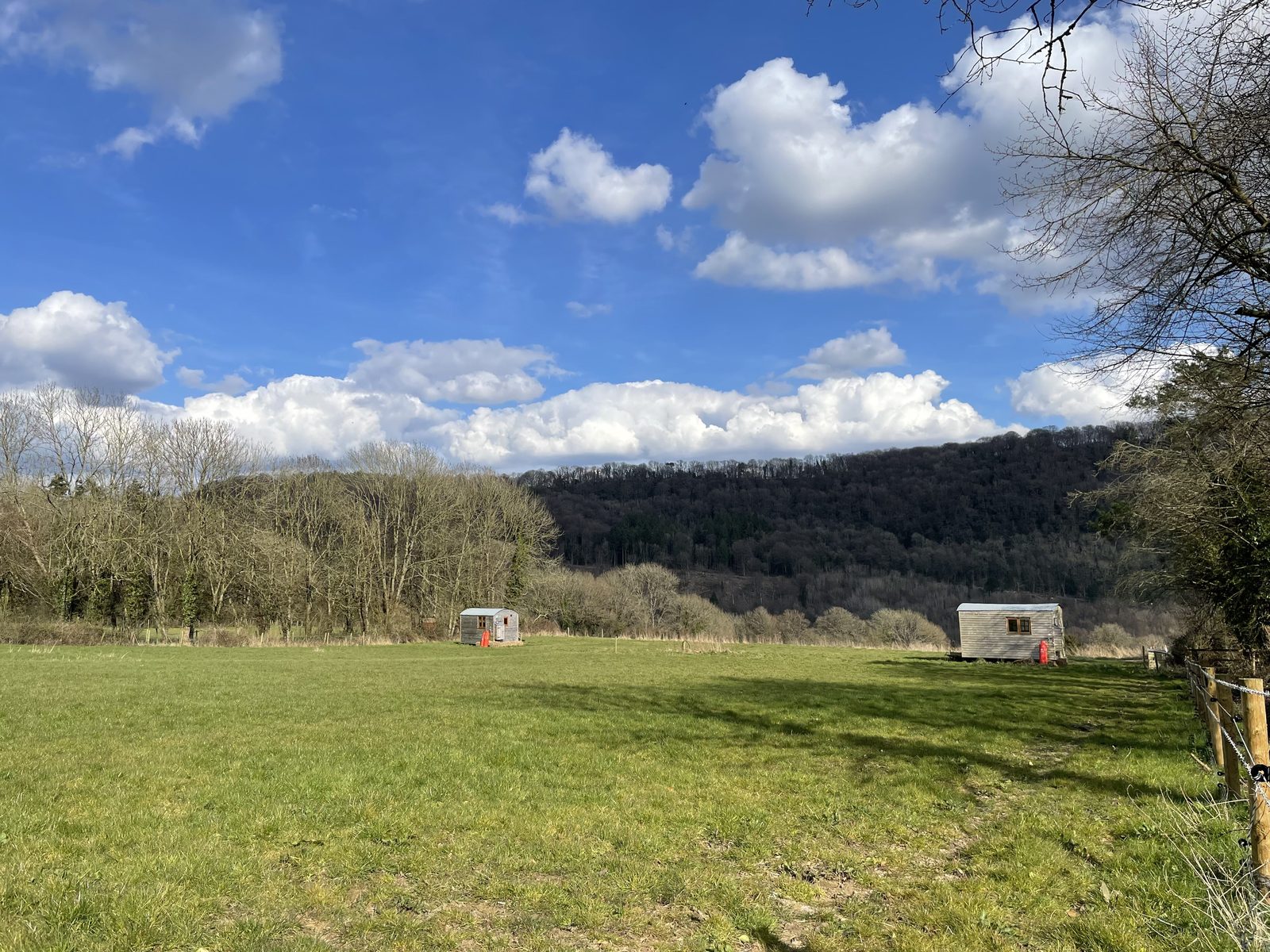 Warren and Burrow's huts seen across their shared field